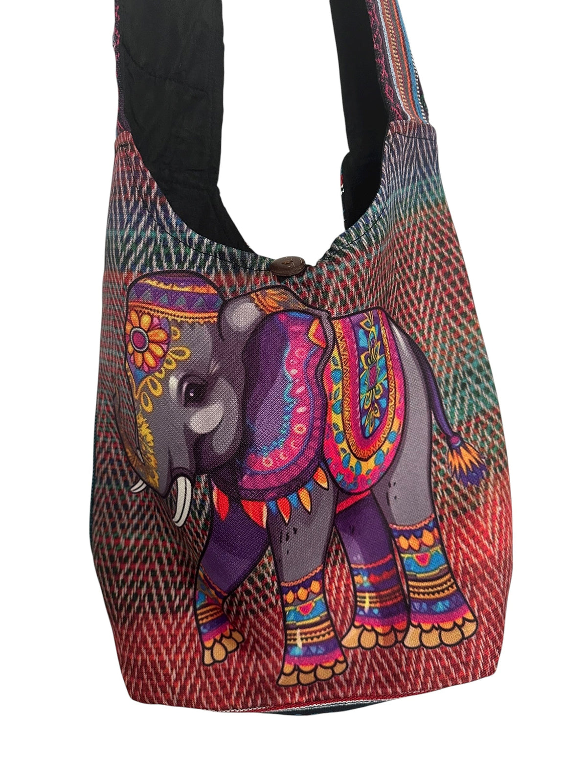 Colorful boho-style elephant print cotton sling bag with zip and button closure, handmade hobo shoulder bag.